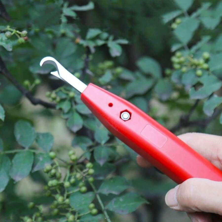 La nueva herramienta especial, el artefacto para recoger frutas y verduras, una cizalla para recoger especificamente diseñpara frutas agrícolas. - Rojo - Ver 1