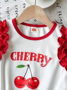 Bộ jumpsuit thời trang nữ trẻ trung, dễ thương, tay bồng, in hình quả anh đào và kẻ caro. - trắng - Xem 4