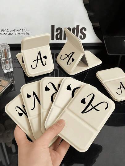 Mini Artistic Love Letter A-Z Foldable Portable Makeup Mirror, ,Includes 1pc Portable Folding Makeup Mirror And 1pc Makeup Powder Puff, Rectangle Compact Dressing Mirror, Mini Handheld Cosmetic Mirror, Suitable For Travel, Dormitory, Office And Home Use, Easy To Carry For Touch-Upmakeup Mirror With Holder, Travel Mirror, Desktop Makeup Mirror, Women's Travel Portable Makeup Mirror Gift
