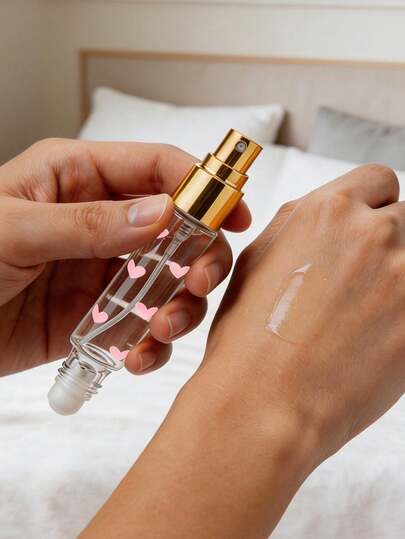 This Dual-Head Multi-Use Perfume Decanting Bottle Has Both Roller Ball And Spray Functions. It Features A Gold-Colored Cap With A Heart Pattern Print, A Transparent Minimalist Design, And A Durable Gold-Color Leak-Proof Cap Suitable For Perfume, Cologne, And Essential Oils.