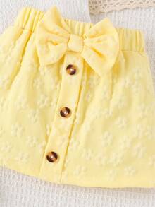 Bộ đồ 2 món cho bé gái, gồm áo sơ mi trắng thắt nơ và chân váy vàng, kiểu dáng thanh lịch, dễ thương cho mùa hè. - Màu vàng - Xem 5