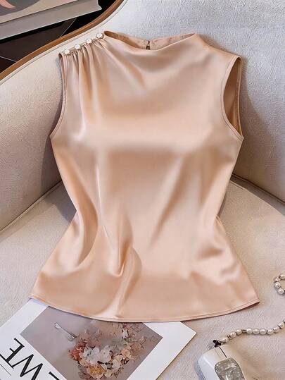 优雅缎面无袖上衣，肩部饰有珍珠，精致百搭，适合约会、工作和聚会等场合。