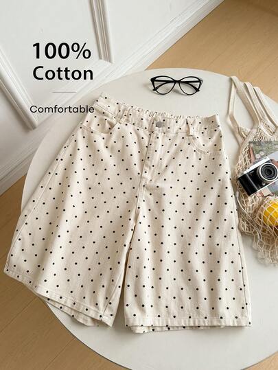 Quần short nữ chấm bi, cạp chun, dáng rộng, thoải mái.