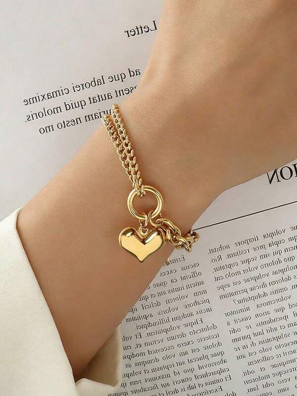 Pulseira feminina em aço inoxidável, com pingente de coração, estilo vintage luxuoso, cor dourada. Ideal para o dia a dia, encontros, ocasiões especiais e como presente no Dia dos Namorados ou para uso diário.