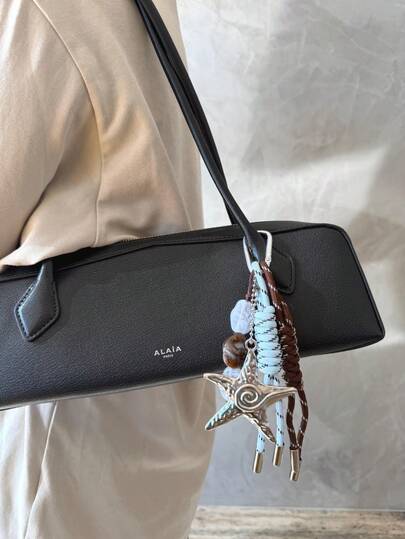 海星包饰钥匙扣，串珠海洋钱包配饰串珠包饰，五角星包饰，星形包饰，绳子包饰，编织绳包饰，撞色包饰，心形包饰，心形包包装饰，心形背包配饰，女士包饰，棕色包饰，节日礼品袋配饰。