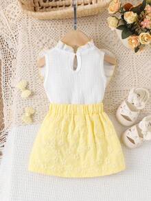 Bộ đồ 2 món cho bé gái, gồm áo sơ mi trắng thắt nơ và chân váy vàng, kiểu dáng thanh lịch, dễ thương cho mùa hè. - Màu vàng - Xem 2