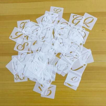 65 ชิ้น ลายฉลุพลาสติกตัวอักษรนำกลับมาใช้ใหม่ได้: ตัวอักษร, ตัวเลข และสัญลักษณ์, เหมาะสำหรับระบายสีบนสิ่งของไม้ - แม่แบบงานฝีมือสไตล์การประดิษฐ์ตัวอักษร