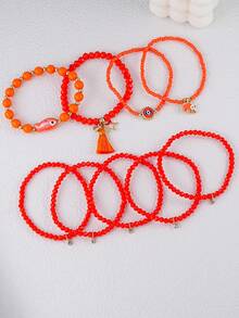 Set de 9 piezas de pulsera con colgantes de cristal y cuentas de semilla con diseños de pez naranja, elefante, ojo malvado y estrella, pulsera multicapa con borlas, adecuado para uso diario, citas y playa en verano de mujeres - Naranja - Ver 4