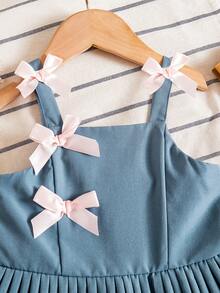 Đầm hai dây xếp ly nhiều lớp cho bé gái, trang trí nơ xinh xắn, kiểu dáng công chúa ngọt ngào và cá tính, phù hợp cho tiệc sinh nhật, trình diễn thời trang và mặc hàng ngày. - Xám - Xem 3