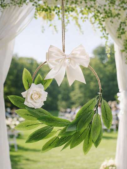 1件白色玫瑰绿叶蝴蝶结悬挂装饰优雅花环墙挂饰品浪漫花园风格圆形不对称叶片排列丝带蝴蝶结细节创意悬挂艺术美学家居装饰适用于婚礼拱门背景门窗墙面展示新娘送礼会订婚派对户外花园仪式装饰