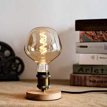 1个可调光LED螺旋灯丝灯泡，DR125 220V 4W 2300K暖光 E27灯头，琥珀色玻璃装饰灯泡，适用于咖啡馆、酒吧、复古家居装饰，尺寸为4.92英寸 x 6.88英寸 - DR125 - 查看 1