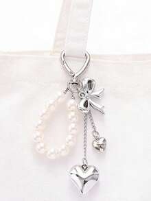 Pendentif nœud perlé mignon unisexe Y2K, breloque de sac en forme de cœur à la mode, design de fermoir à crochet rotatif en forme de cœur argenté, pince à ressort, étoile de mer, nœud et éléments de cœur, porte-clés breloque de téléphone, porte-clés breloque de téléphone étoile de mer, accessoire élégant pour femmes, accessoire de sac, cadeau de fête et de vacances, cadeau pour étudiants et enseignants, cadeau original pour la famille et les amis - Argent - Voir 8