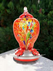 Alimentador de colibríes artesanal de vidrio. El alimentador de colibríes viene con un clip anti-hormigas. Es un alimentador de pájaros de jardín colgante de exterior hecho de vidrio (en color llama y azul agua) con dos opciones disponibles. - 32 oz Rojo - Ver 9