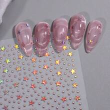 Pegatinas de uñas con estrellas metálicas doradas y plateadas estilo Y2K, disponibles en colores negro, blanco, rosa y azul con brillo autoadhesivo, tanto en colores metálicos como neón. Estas decoraciones de uñas son perfectas para manicuras, fiestas y eventos. - Multicolor - Ver 10