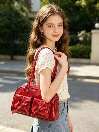 1个女童蝴蝶结装饰PU拉链时尚单肩包，适合所有季节日常使用