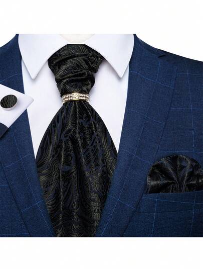Bộ 4 món sang trọng dành cho nam giới: cà vạt Ascot họa tiết cây nhiệt đới màu xanh hoàng gia, khăn cài túi áo, khuy măng sét và nhẫn vàng, thích hợp cho tiệc cưới.