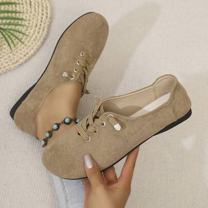 女士经典系带休闲软底平底鞋，舒适百搭，适合日常穿着，如工作、购物、户外活动等。