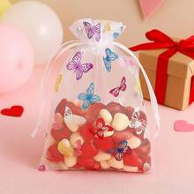 Conjunto de 10 elegantes saquinhos de organza com cordão e estampa de borboletas em tons suaves. Tecido de malha transparente com fechamento duplo, ideais para guardar joias, doces e embalar presentes. Perfeitos para casamentos, festas de aniversário e pequenas lojas (multicoloridos). - Multicolorido - Ver 5