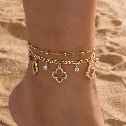 1件梦幻精致优雅高端闪耀金色镂空四叶草吊坠脚链（女士款）（由于手工裁剪，链子上的珠子数量随机，但最终长度固定，不影响佩戴效果）