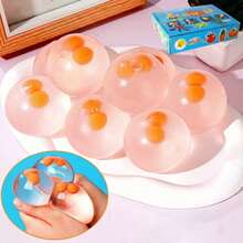 Bóng nước hình trứng bóp: Đồ chơi giảm căng thẳng hình trứng dễ thương, chân thực, được làm từ chất liệu TPR mềm mại, giúp giảm lo âu, là món quà Ngày của Mẹ hoàn hảo cho trẻ em và những người yêu thích đồ chơi giảm căng thẳng. - Đồ chơi bóp hình trứng hai lòng đỏ - Xem 6