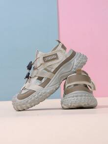 1 par de zapatillas deportivas gruesas para niños, diseño de costado hueco, cierre de conveniente, suela gruesa con patrón texturizado, bloqueo de color caqui, de moda - Caqui - Ver 1