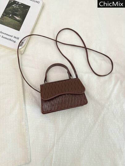 纯色迷你亮面褶皱纹理手提包，优雅百搭的翻盖方形时尚女士斜挎包，适合购物、装钱包、年轻女性、大学生、职场新人及白领人士。非常适合办公室、大学、工作、商务、通勤、户外活动、旅行和郊游等场合。