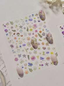 1片金色箔纸花卉美甲贴纸，雏菊和郁金香美甲贴花，多功能自粘美甲用品，适合女孩和女士，是春季和节日的理想之选，适用于家庭和美甲沙龙使用。 - 彩色 - 查看 2