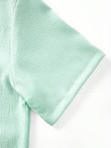 Bộ 2 món gồm áo sơ mi ngắn tay và quần dài dệt jacquard thời trang, dáng rộng, thoải mái, thích hợp làm quà tặng cho chồng/bạn trai. - Màu xanh Bạc hà - Xem 4
