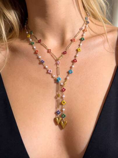 1 pieza Collar largo en forma de Y con trébol de cuatro hojas con forma de corazón de acero de titanio, inspirado en el océano, creativo, de moda, elegante, exquisito, de lujo ligero, dulce y glamoroso para mujeres, hermanas, parejas, baile de graduación o regalo de joyería; perfecto para uso diario, citas, fiestas, bodas, vacaciones y playas de verano; joyería colorida