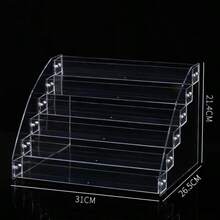 1 chiếc kệ trưng bày nhiều tầng bằng acrylic trong suốt mới, dùng để đựng son môi, nước hoa, mỹ phẩm. Kệ nhiều tầng để sắp xếp các sản phẩm chăm sóc da, trang điểm, tượng nhỏ trong hộp bí ẩn. Chân đế hình chóp chắc chắn, thích hợp cho phòng khách, phòng tắm, phòng ngủ, trang trí nhà cửa. - Trong sáng - Xem 17
