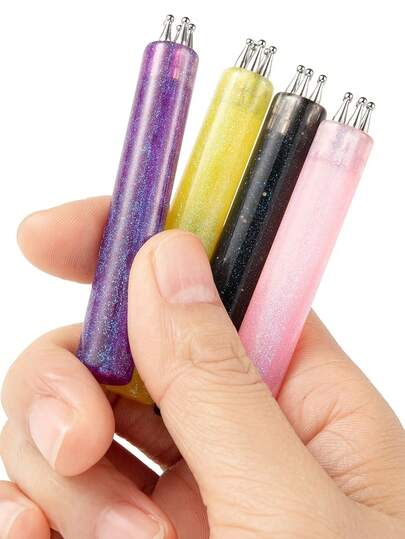 五合一美甲点彩笔，配有星空亚克力笔杆，可一笔画出梅花图案，适合初学者和专业美甲师，是美妆爱好者和美甲师的必备单品。