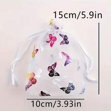 Conjunto de 10 elegantes saquinhos de organza com cordão e estampa de borboletas em tons suaves. Tecido de malha transparente com fechamento duplo, ideais para guardar joias, doces e embalar presentes. Perfeitos para casamentos, festas de aniversário e pequenas lojas (multicoloridos). - Multicolorido - Ver 9