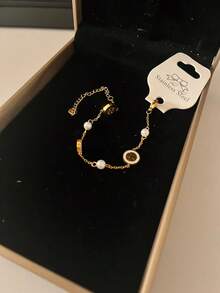 Vòng tay ngọc trai cao cấp mạ điện bằng thép titan, trang sức thanh lịch, nhẹ nhàng cổ điển. - Vòng tay ngọc trai hình học - Xem 4