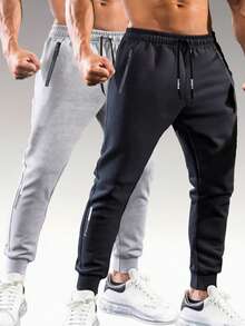 Quần jogger nam dáng rộng, cạp chun, màu đen, thoáng khí, ống côn, có túi khóa kéo, thích hợp cho tập luyện thể dục. - Nhiều màu - Xem 1