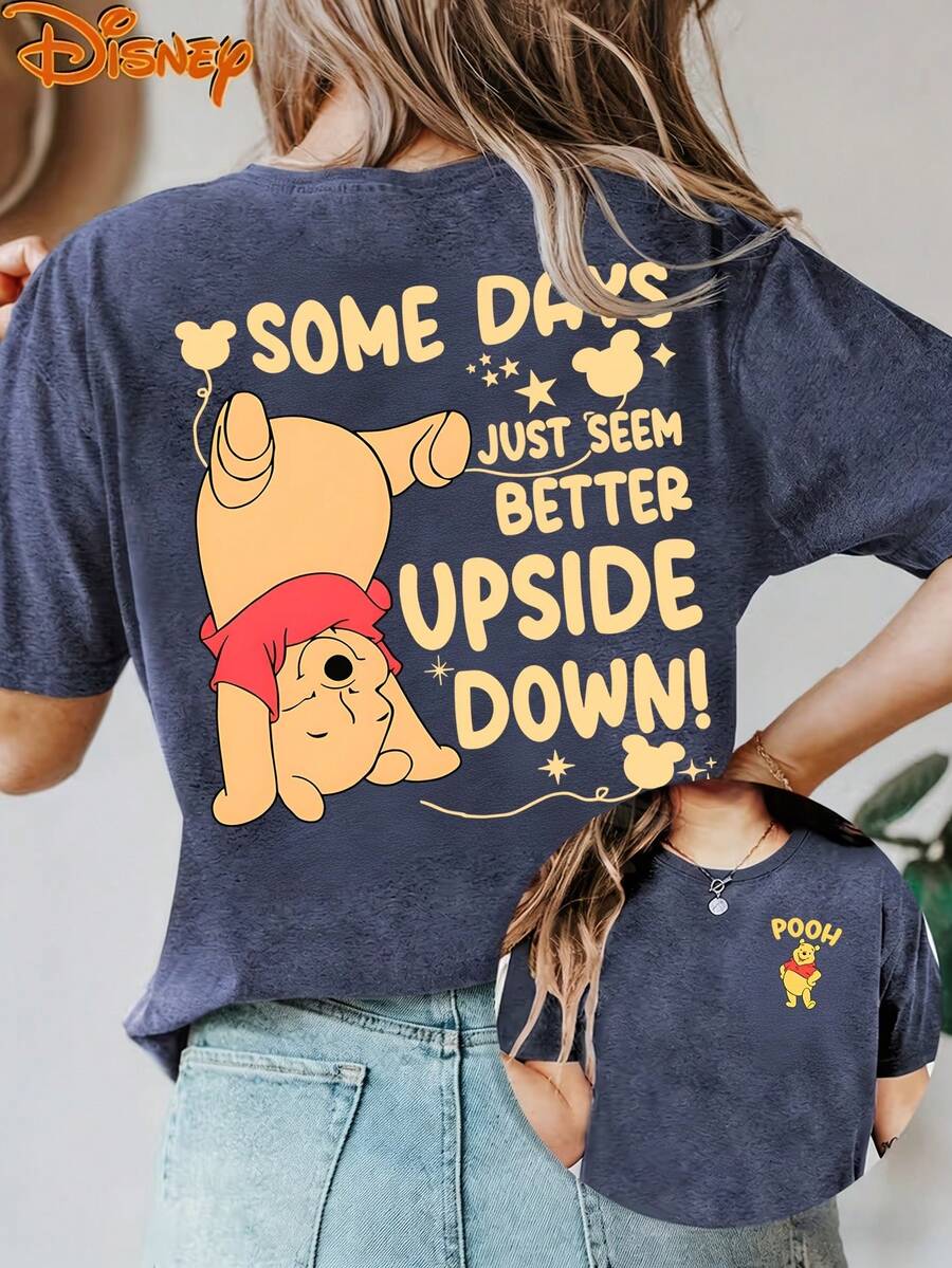 Disney License T Shirts,Women's Loose Fit Disney T-Shirt With Playful Back Print Of Winnie The Pooh Doing A Handstand And Quote "SOME DAYS JUST SEEM BETTER UpsideDown!", Mickey Mouse Balloon And Star Accents, Front Small "POOH" Chest Graphic, Fun And Upbeat Design ,Camiseta, Summer Outfits For Women, Summer Clothes, Summer Tops, Tops For Women, Festival Outfits, Summer Tops For Women, Mother's Day, Mother's Day Clothing, Gifts For Family And Friends, Spring Outfits For Women, Officially Licensed Disney T-Shirts, Disney Men's And Women's Spring/Summer Fashion Casual Short-Sleeve T-Shirts - Màu xanh lam - Xem 1