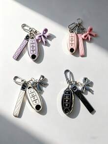 Bow Knot Keychain Set Ev 4-Key For Nissan Key Chain Protector (With Key Chain) - Soft TPU, Fit For Nissan Altima, Sentra, Maxima, Rogue, Armada, Pathfinder & For INFINITI Smart Remote Control - Perfect Gift - Bow - View 1
