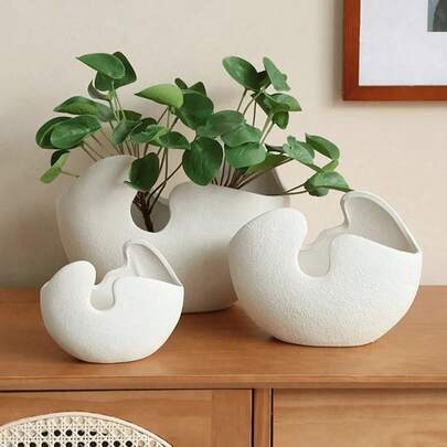 This Asymmetric Shaped Art Resin Vase And Planter Is Perfect For Displaying Small Plants Or Stems On Coffee Tables, Desks Or Windowsills. It Adds A Minimalist Natural Ambiance To Modern Living Spaces And Offices.