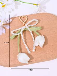 1个优雅甜美清新仿珍珠蝴蝶结郁金香钥匙扣，适用于包包、耳机盒、手机壳、汽车装饰、闺蜜礼物、DIY装饰、节日和派对礼物 - 鑰匙扣 - 查看 7