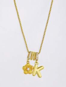 1 Mặt dây chuyền hình hoa năm cánh viết tay nghệ thuật tinh tế, lấp lánh, sang trọng, đính đá Cubic Zirconia, chữ cái đầu từ A-Z, dành cho nữ, thích hợp cho trang phục mùa hè hàng ngày. Món quà tuyệt vời cho sinh nhật, ngày lễ, kỷ niệm. - Vàng - Xem 3