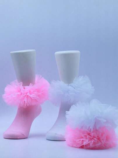 2 đôi tất công chúa xếp ly cho bé gái với thiết kế bồng bềnh.