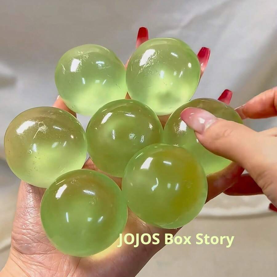 手工梨形减压挤压球玩具，创意梨汁葡萄通风麦芽糖玩具