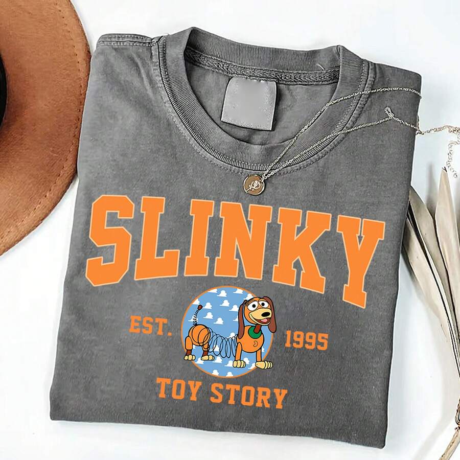 Disney Toy Story Slinky Dog EST 1995 Vintage Washed Black Oversized Cotton T-Shirt, Retro Loose Fit Tee For Women Men, Perfect For Disney Fans, Daily Wear & Gift - Xám - Xem 1