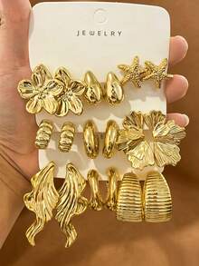 Bộ khuyên tai hình chữ C thời trang dành cho nữ, gồm 6-18 chiếc, được làm từ nhựa ABS với kết cấu kim loại mờ, chi tiết tinh tế, tự nhiên và sống động, tối giản và nhỏ gọn, phù hợp để đeo hàng ngày. - Vàng - Xem 9