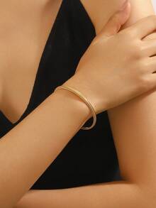 Vòng tay bằng thép không gỉ mạ vàng 18K kiểu dây xương rắn - Cấu trúc dây xương rắn lò xo, chất liệu dây mềm mại, thiết kế nhiều lớp tự xếp chồng, phù hợp cho việc đi lại hàng ngày, đeo nhiều lớp và làm quà tặng cho quý cô thanh lịch. - Vàng - Xem 2