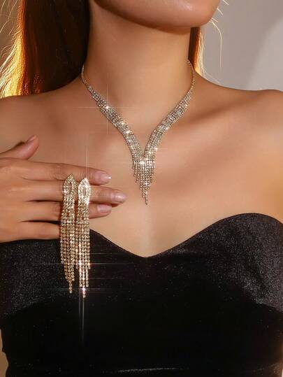 This Elegant 2 Pieces Women's Jewelry Set Features A V-Shaped Design And Is Adorned With A Sparkling Gold Rhinestone Tassel Necklace And Earrings. It Is Perfect As A Jewelry Gift For Banquets, Parties, Weddings, And Other Occasions, And Is Also An Ideal Accessory For Valentine's Day.