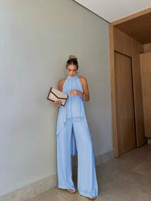 Conjunto feminino de duas peças, elegante, em cor sólida, com top curto torcido na frente e calça comprida, ideal para festas, férias, passeios e encontros na primavera/verão. - Azul - Ver 4