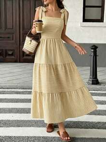 Đầm nữ phong cách Bohemian kẻ sọc, hở lưng, dài ngang gối, có dây buộc vai, túi, dáng chữ A xòe bồng bềnh, phù hợp cho mặc hàng ngày và đi nghỉ mát. - Màu vàng - Xem 3