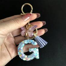 1 móc khóa chữ cái đầu tên dành cho nữ, mặt dây chuyền hình trái tim đính kim sa và hình bướm kèm tua rua, quà tặng trang trí balo độc đáo cho mẹ, bố, nhân dịp tốt nghiệp và giáo viên. - Màu tím hoa cà - Xem 34