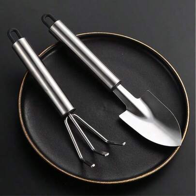 OBOVAY Bộ 2 xẻng và cào mini, bay làm vườn cầm tay sáng tạo, dụng cụ làm vườn ngoài trời bằng thép không gỉ, dụng cụ đào đất bãi biển, dụng cụ vun đất trồng cây trong chậu, bay và cào kim loại, thích hợp cho làm vườn và trồng cây trong chậu.