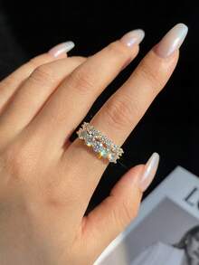 1 chiếc nhẫn bạc 925 đính 5 viên kim cương Moissanite tròn màu D (0.3ct) hoặc 7 viên kim cương Moissanite tròn màu D (0.1ct), thích hợp làm quà tặng đính hôn, cưới, quà sinh nhật/kỷ niệm cho vợ/bạn gái hoặc trang sức cô dâu. - Vàng - Xem 3